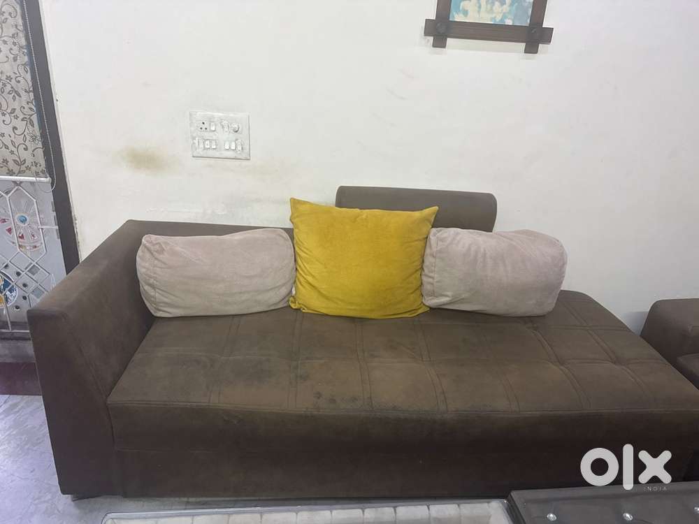L shape sofa with center table