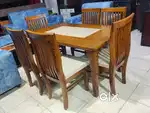 Dinning table may features a single colour or a limited palette in