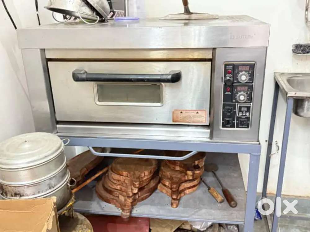 Kitchen oven batlar company table chair and other cafe iteams