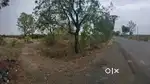 2.5 Acre road side land on State Highway.