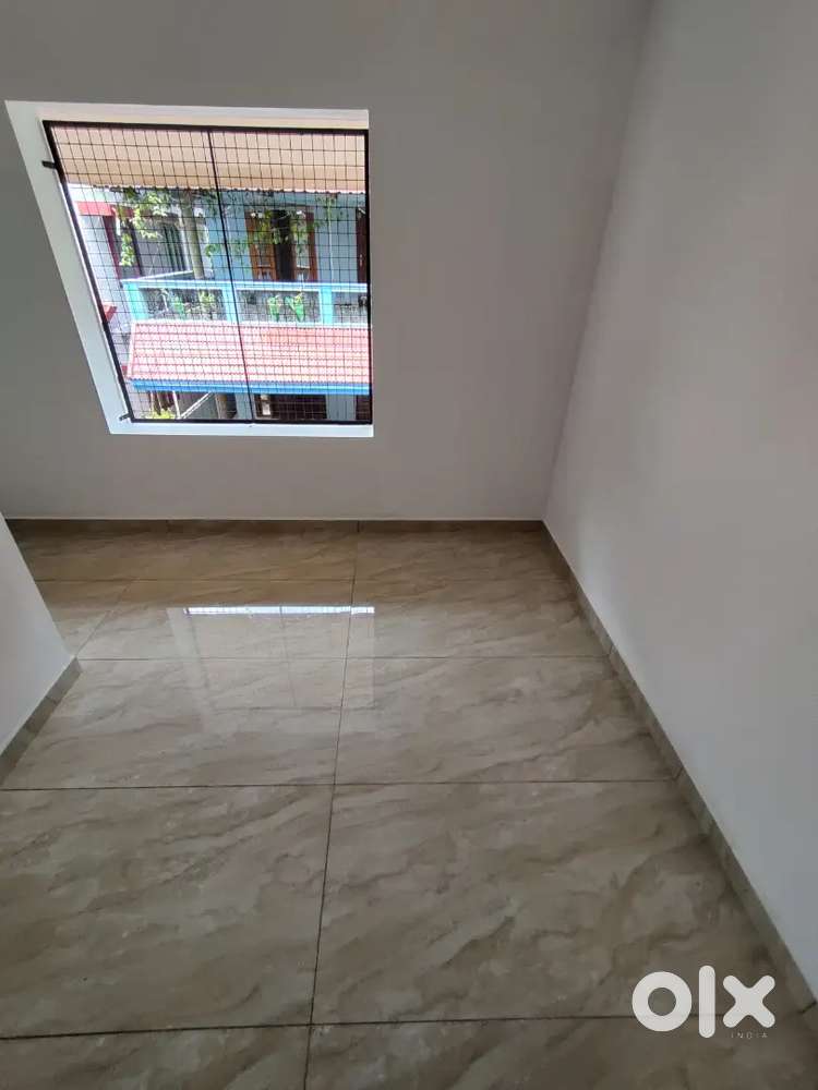 Single room with bathroom bed. table chair