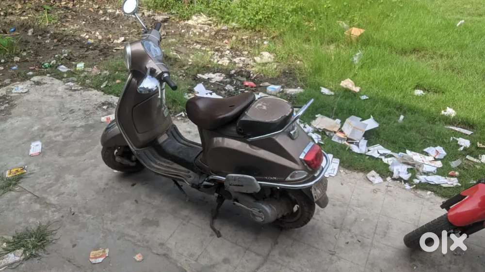 Running Vespa Scooter