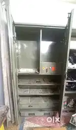 Godrej Iron Almirah and 2 steel racks in good condition,no timepass pl