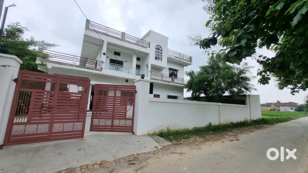 A cinematic view house with private car parking.