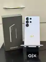 Samsung s25 ultra with box next to showroom condition