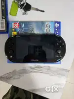 EXCELLENT CONDITION PS VIT PCH2K WITH 128GB STORAGE MEMORY