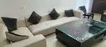 L-shape sofa set with center table and cushions
