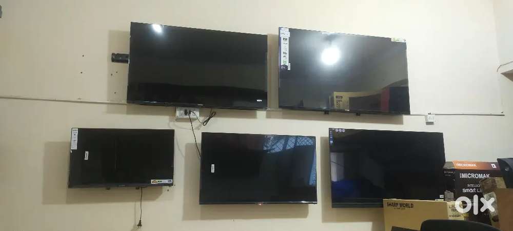 32 inches frame less Q led with Bluetooth voice control remote builtin