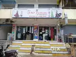 Garments and matching shop for sale with furniture