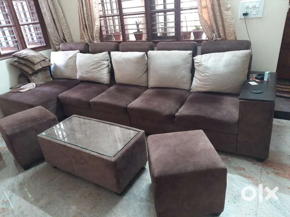 Sofa set with 2 puffies & a teapoy