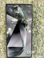 Samsung s24 ultra with box bill charger and 4 cases under warranty