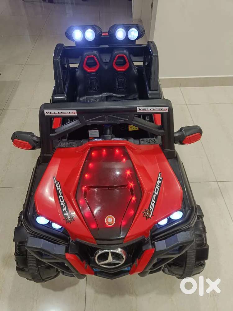 Kids Battery Operated Ride-on Car  4-Wheeler Jeep with Lights & Music