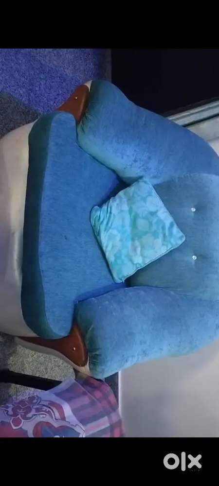 Luxurious sofa with glass center table