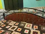 Wrought-iron bed.
