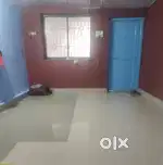 One room and kitchen with attached lavatory.