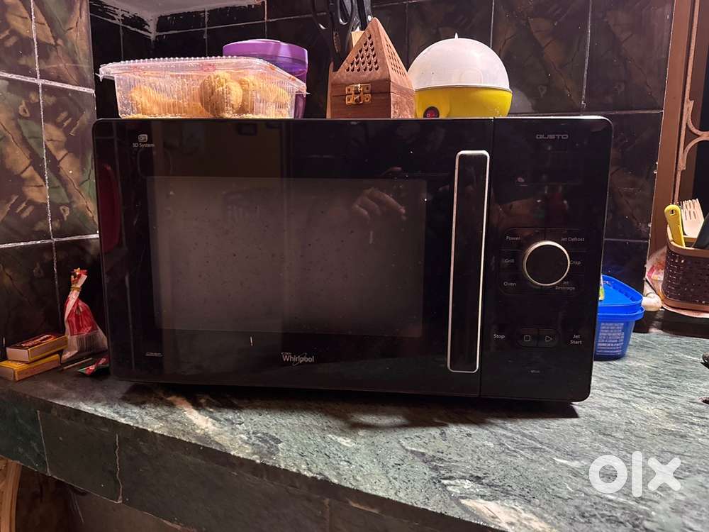 Microwave next to new