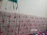 Single size metal cot with mattress