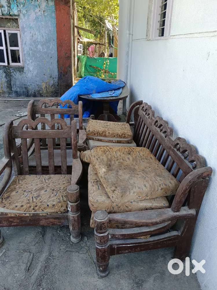 Wooden sofa with chairs and table. Dinning table