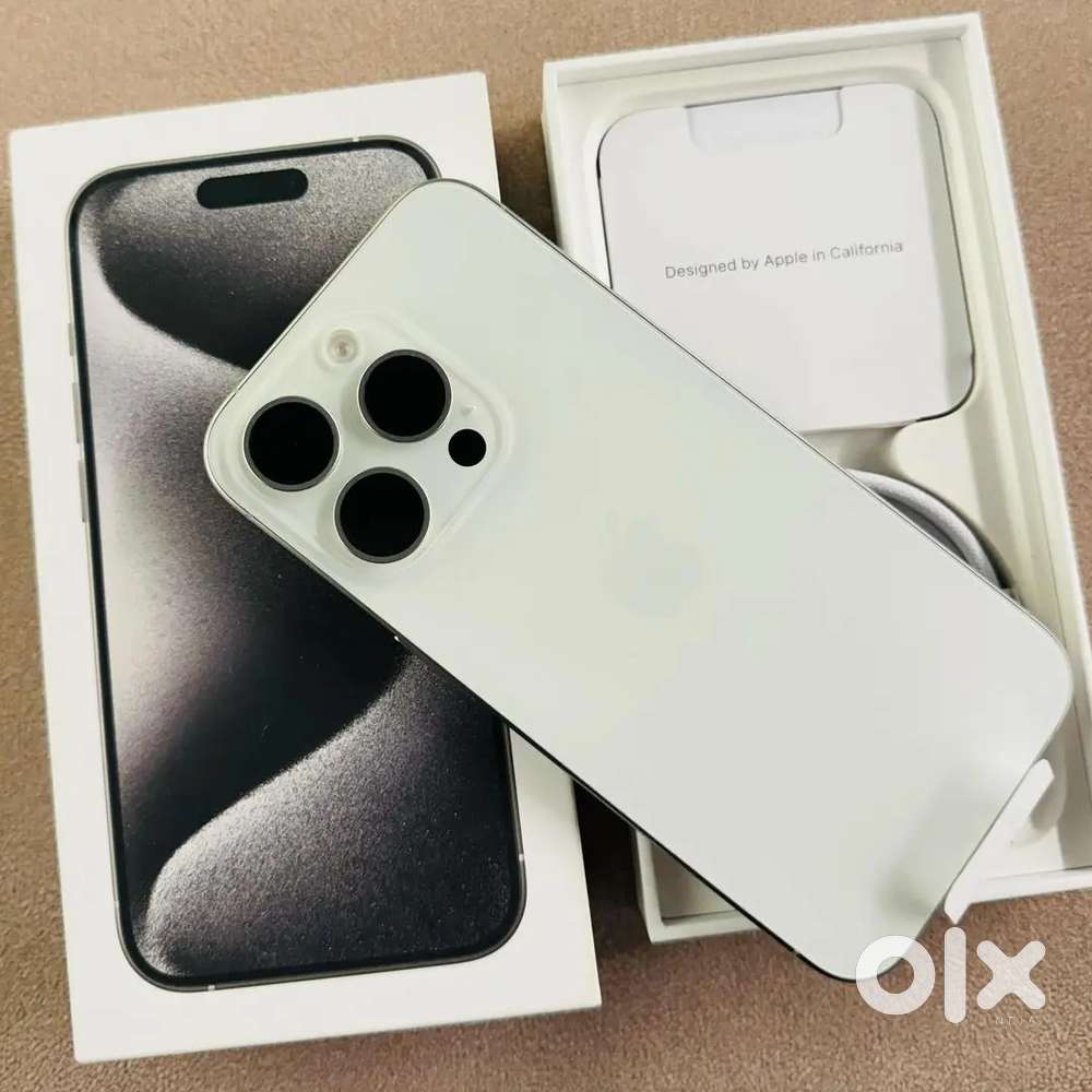 Selling my 4 months old I phone 15p in white colour/.Need urgent money