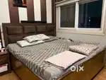 Wooden 6x6 double bed with storage boxes and  mattress