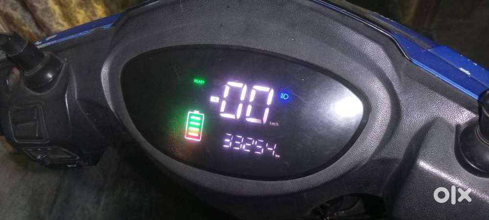 Electric scooty, lithium  battery, average milage : 8 to 12 km, dish
