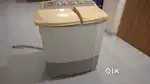 LG 7kg semi automatic top load , cream color