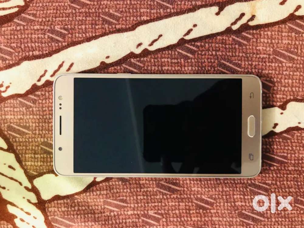 Samsung galaxy j5 old is gold very neat and clean condition storage 32