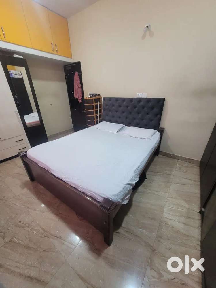 Queen size wooden bed