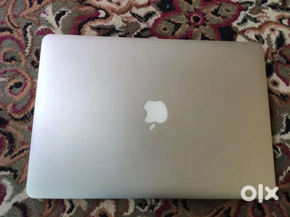 Mac book pro 100% condition without any fault very less used .