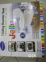 Baby folding booster chair (brand new)