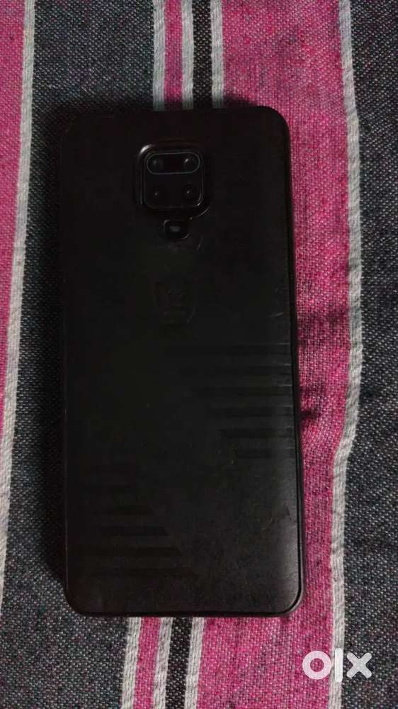 Redmi note 10 in good condition with cover