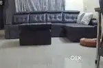 Sofa cum bed with storage and center table