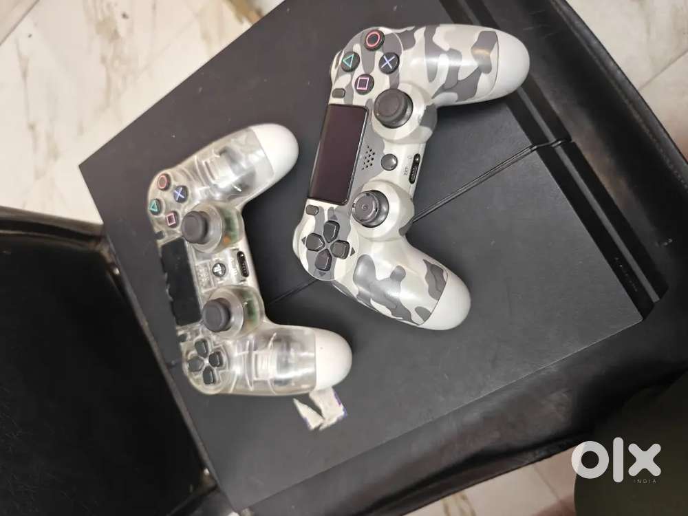 Ps4 1tb ok condition 12 game including in ps4  2 rimote control