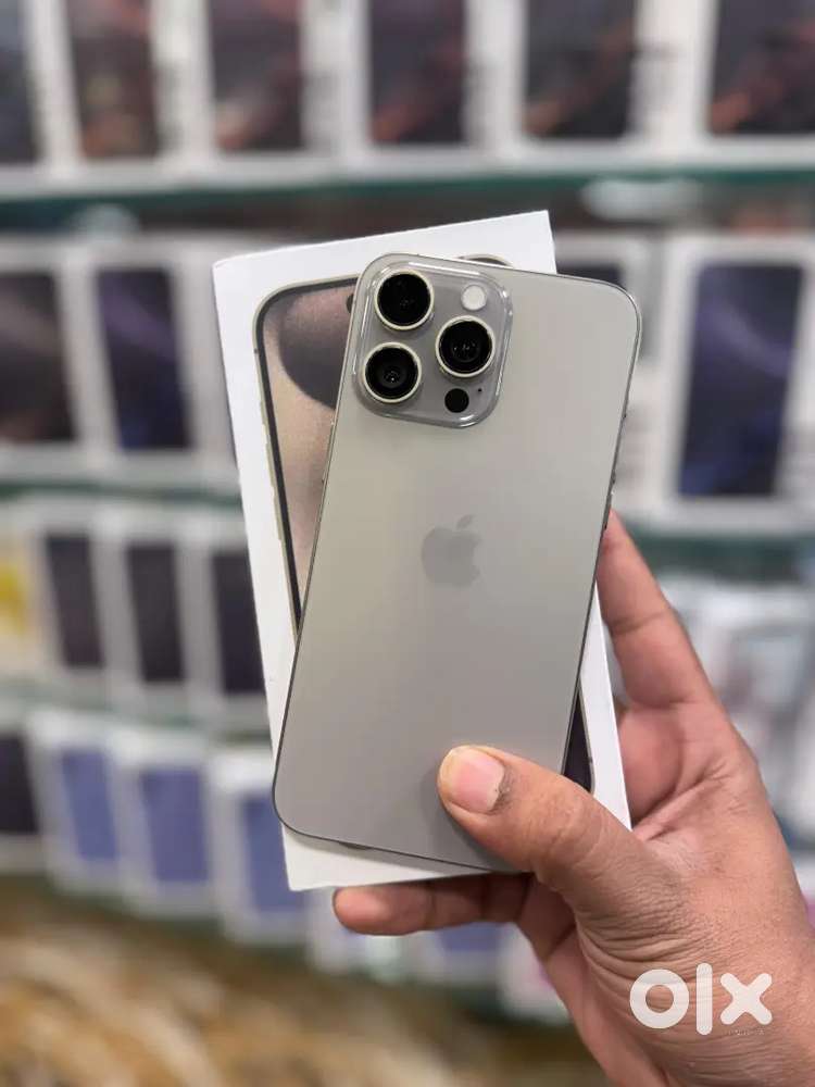 IPHONE 15 PRO MAX 100% battery health with 1 year warranty it's Refurb