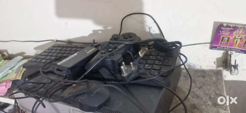 Less use and with several computer game CDs. A joystick