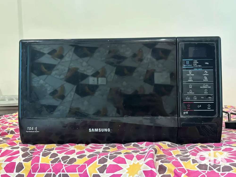 Samsung microwave and four burner gas stove