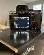 Sony ILCE - a7siii camera body with lens.