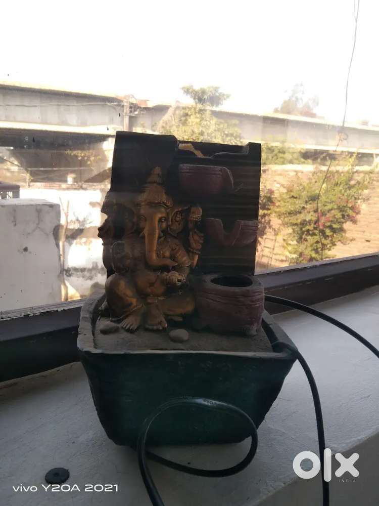 It is an water fountain of lord Ganesh
