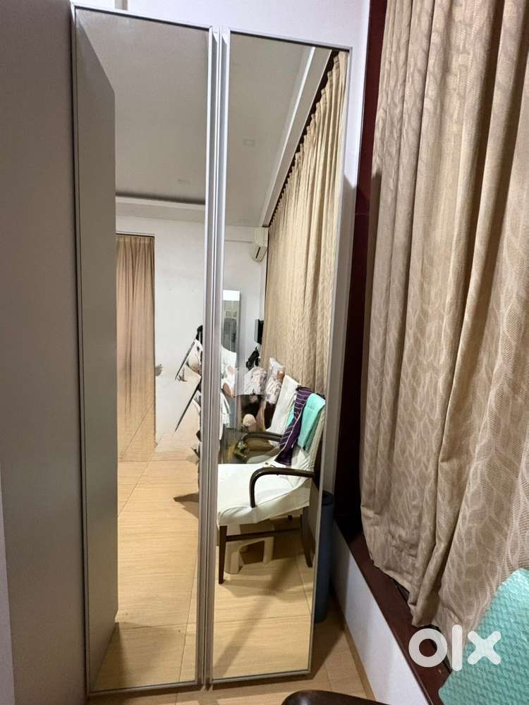 Wooden almirah with mirrors