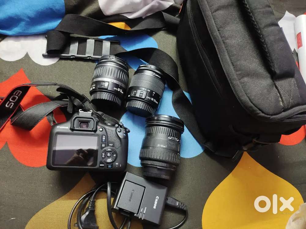 Canon 1500D along with two 18-55mm lens and 1 sigma lens