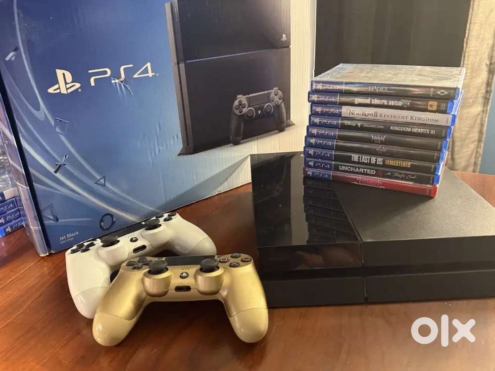 Sony PlayStation 4 Console (500GB, CIB) + 2 Controllers + 9 Games