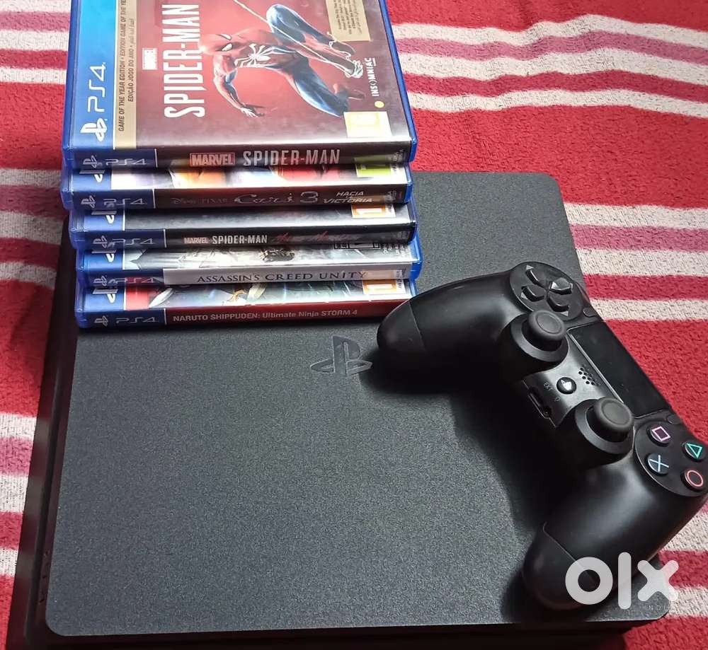 PS4 Slim 1TB + 5 Original Disc Games