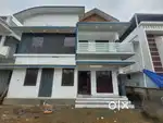 A SUPERB NEW 4BED ROOM 2100SQ FT 6CENT VILLA IN MANNUTHY,THRISSUR
