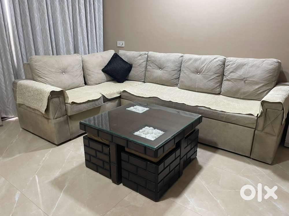Sofa cum King size bed. Centre table.