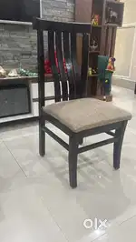 4 seater wooden dining table with glass top
