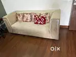 7 seaterCream colour sofa with matching cusions and with table