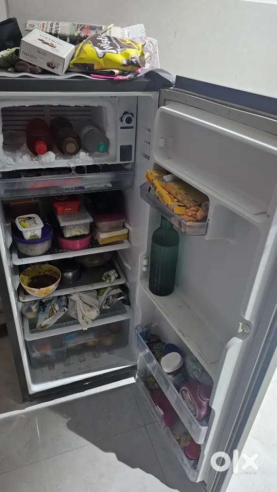 Whirlpool fridge 200l with 1 year remaining warranty