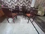 6 seater dinning table with glass top and 7 seater sofa set