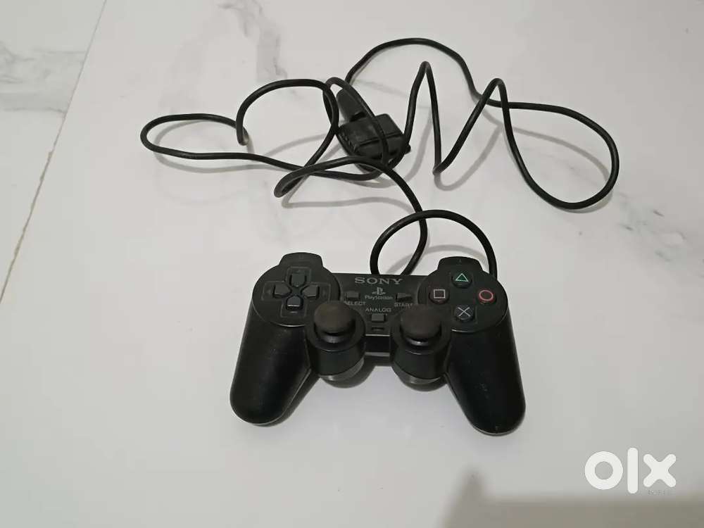 Sony DualShock 2 controller for the PlayStation 2 console. 