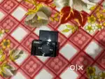 Canon Camera + Free Accessories + Free instant Fuji cam + Free 3 bags